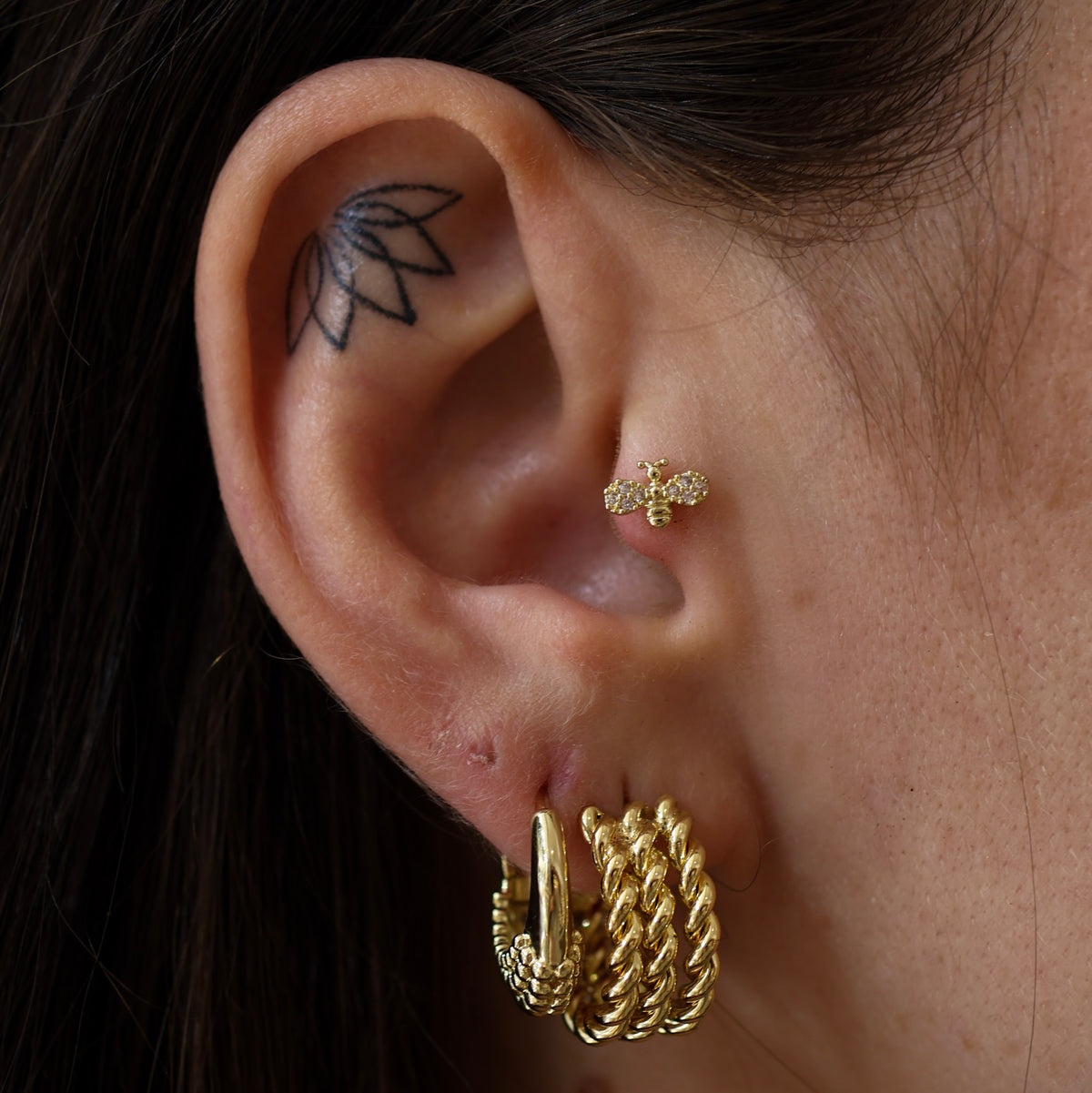 TRAGUS PIERCING ARI